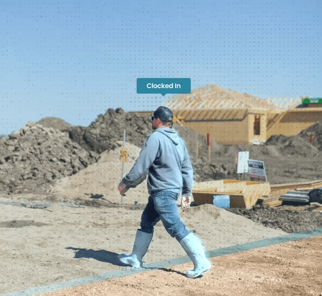 Construction crew walking on site with automatic time tracking